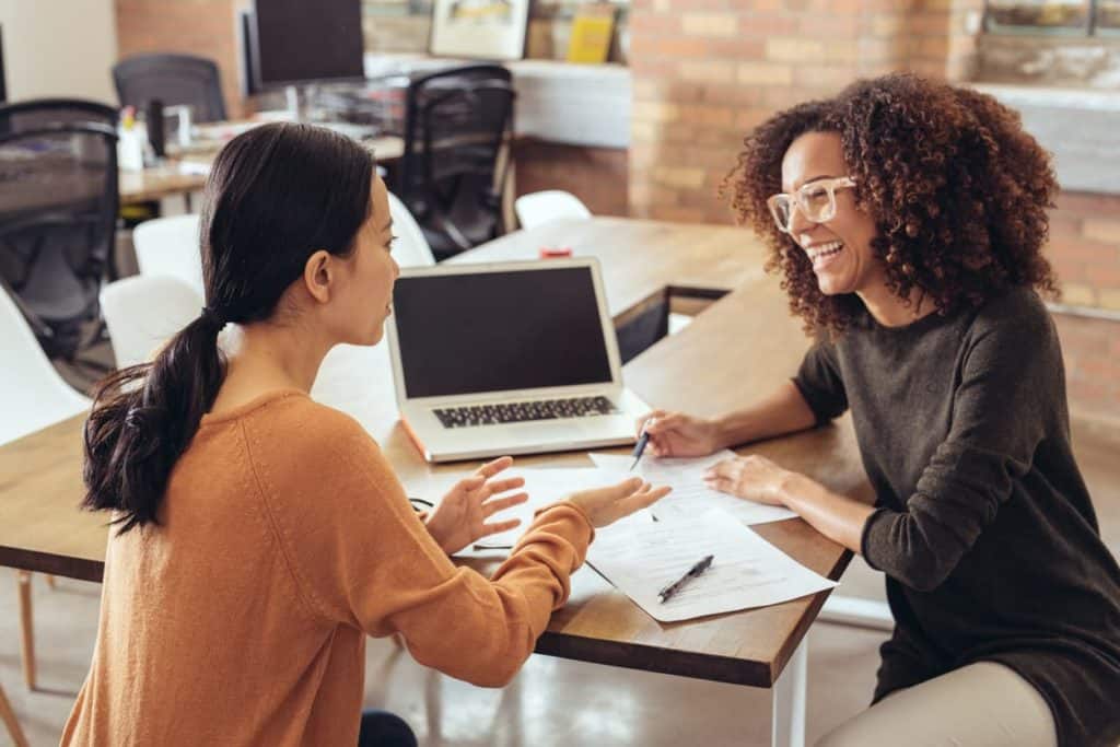 two women discussing